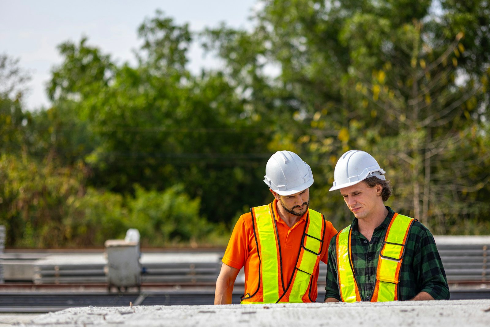 Construction professionals reviewing plans
