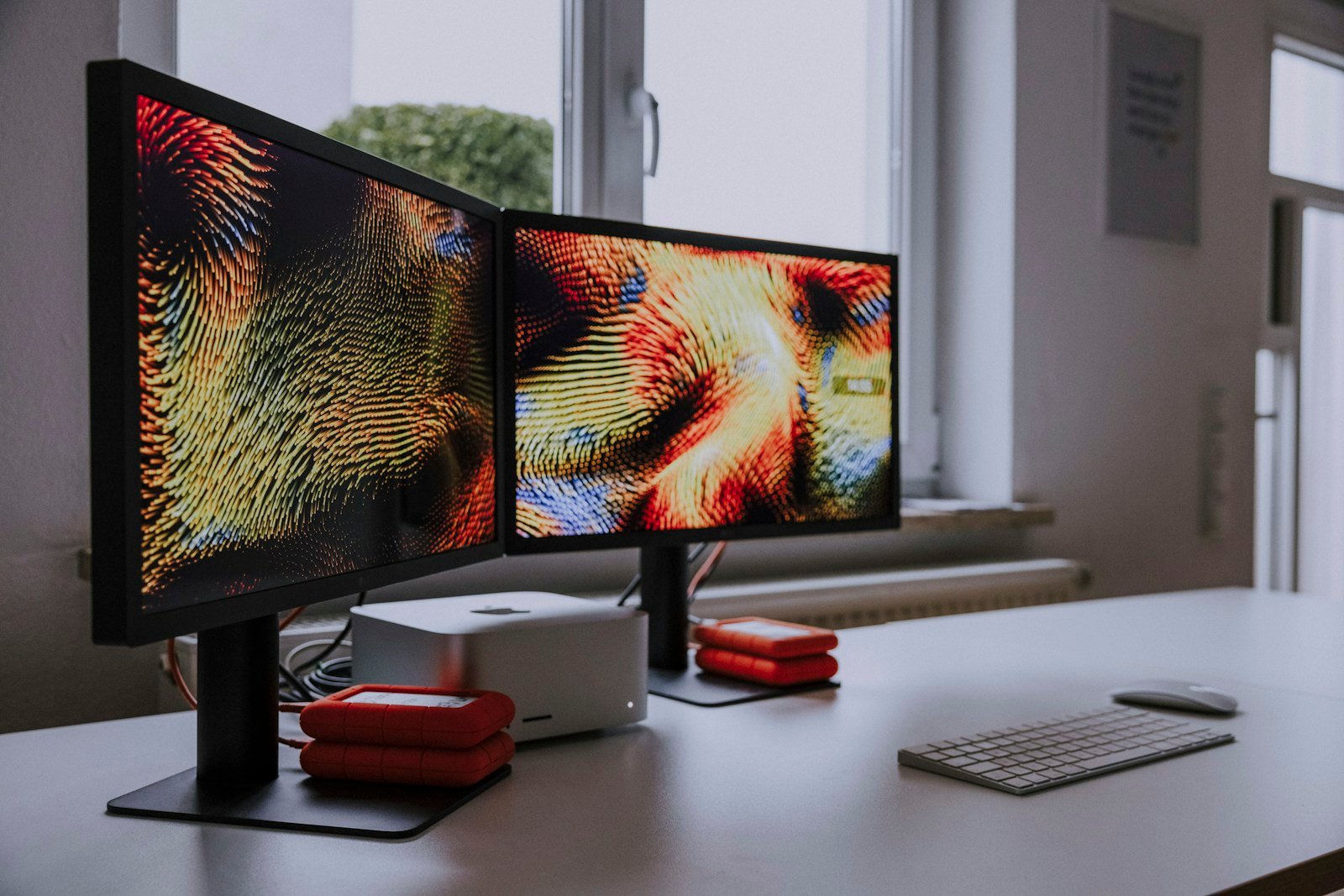 Creative studio with dual-monitor design workstation